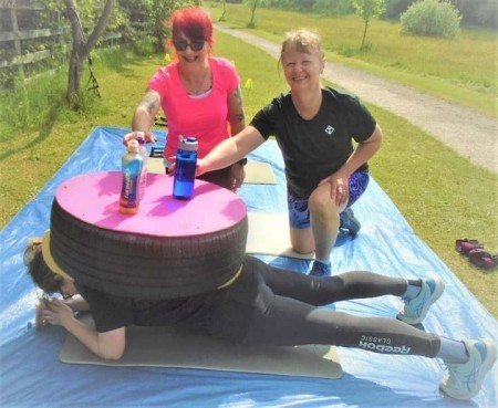 Debbie Kemp, Operations Manager (pictured below tyre!)